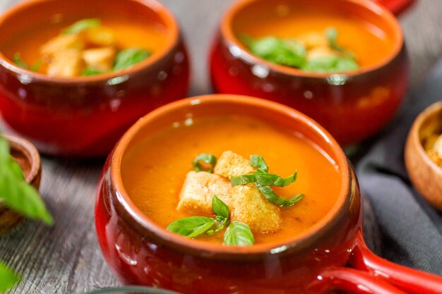 Roasted tomato soup with fresh basil and croutons.