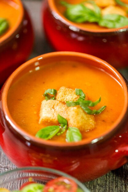 Roasted tomato soup with fresh basil and croutons.