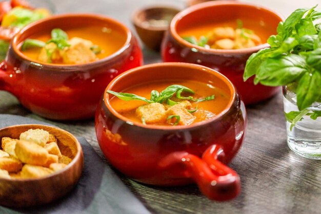 Roasted tomato soup with fresh basil and croutons.