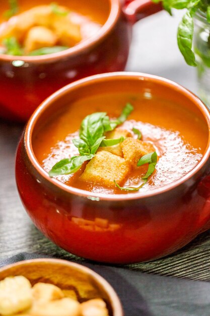 Roasted tomato soup with fresh basil and croutons.