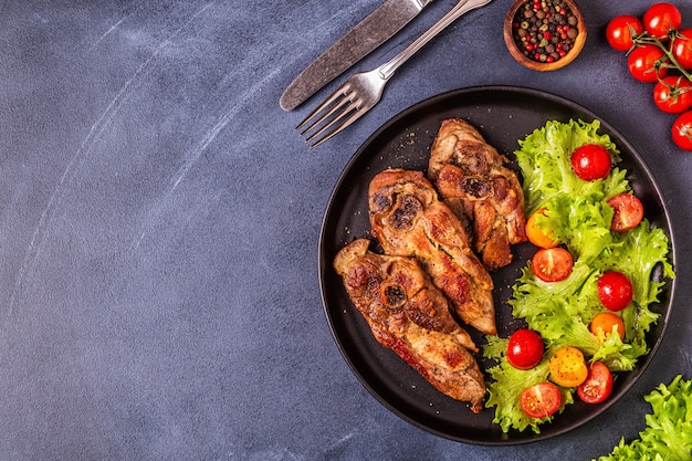 Roasted turkey steak with salad