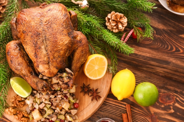 Roasted turkey with stuffing served on holiday table