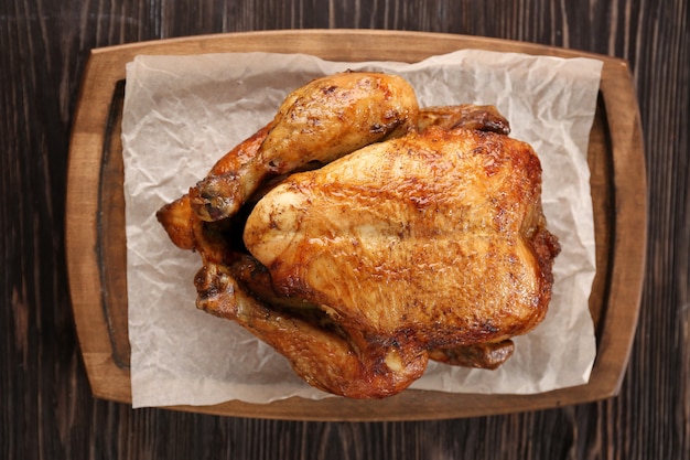 Roasted turkey on wooden board