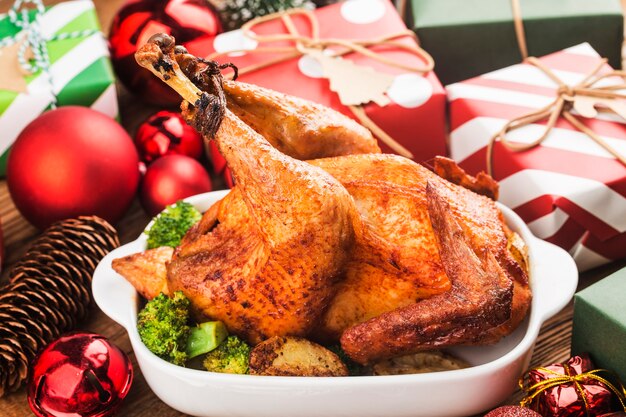 Roasted whole chicken with Christmas decoration