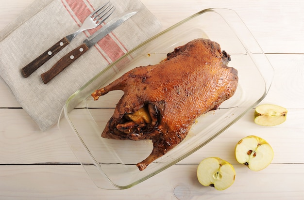 Roasted whole duck stuffed with apples