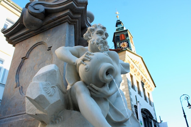 Robba Fountain and city hall in a summer day in Ljubljana Slovenia