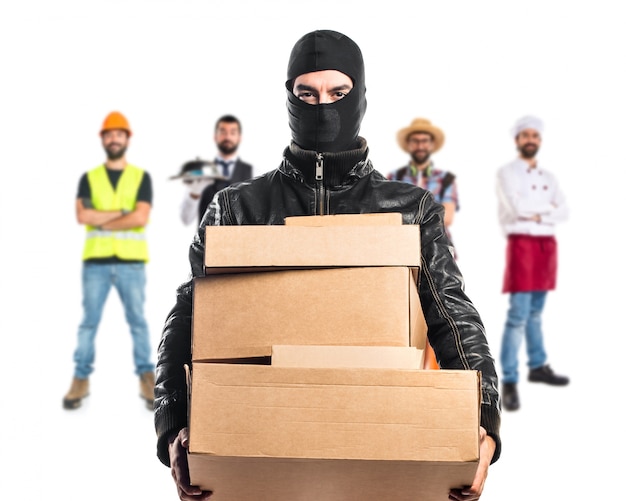 Robber holding boxes