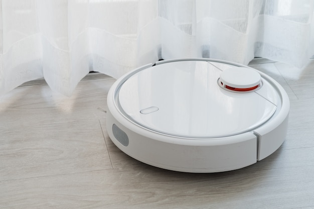 Photo robot cleaner, vacuum cleaner on floor