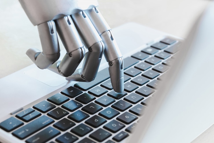 Photo robot hands and fingers point to laptop button advisor chatbot robotic artificial intelligence concept