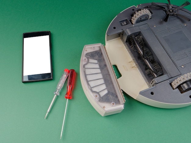 The robot vacuum cleaner is disassembled, the concept of
repairing a robot vacuum cleaner