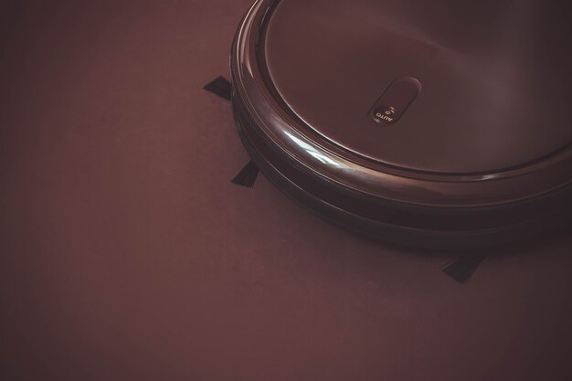 Robot Vacuum Cleaner. Smart life technology concepts. Holding, clean.