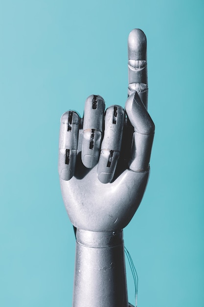 Robotic hand in retro toekomstige stijl wijzende vinger
