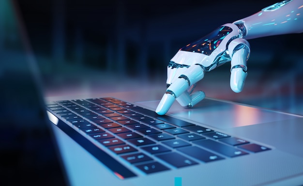 Photo robotic hand pressing a keyboard on a laptop