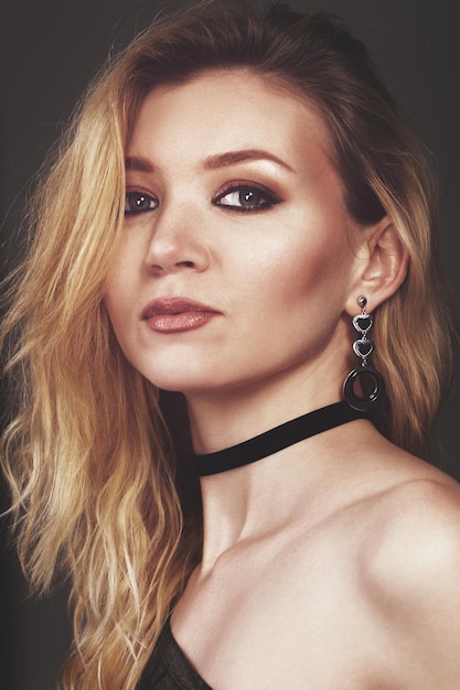 Rock baby. Fashion portrait of a young beautiful girl in the studio