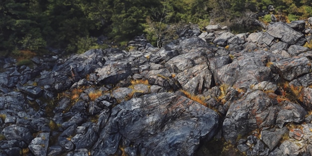 A rock face with the words " the mountain " on it