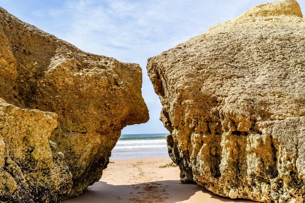 Rock formation on beach in portugal