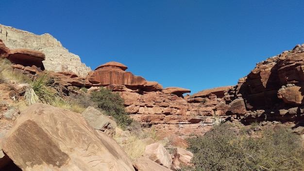 Rock formations against blue sky