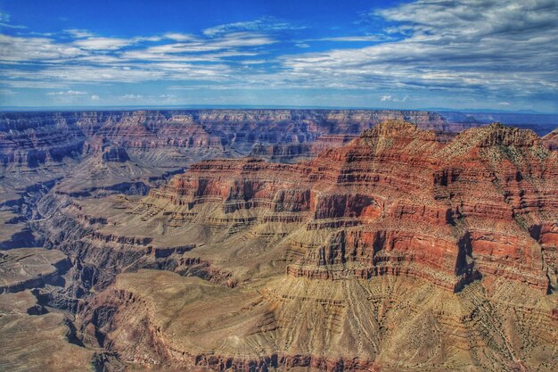 Rock formations at grand canyon against sky