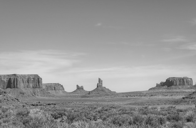 Rock formations on landscape against sky