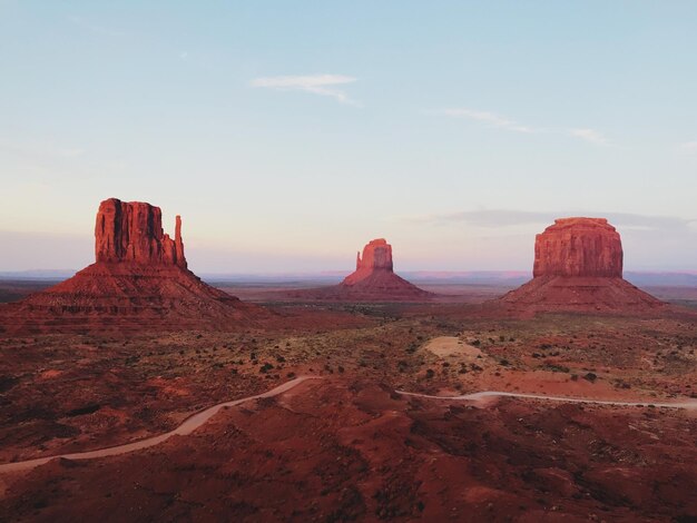 Rock formations on landscape against sky