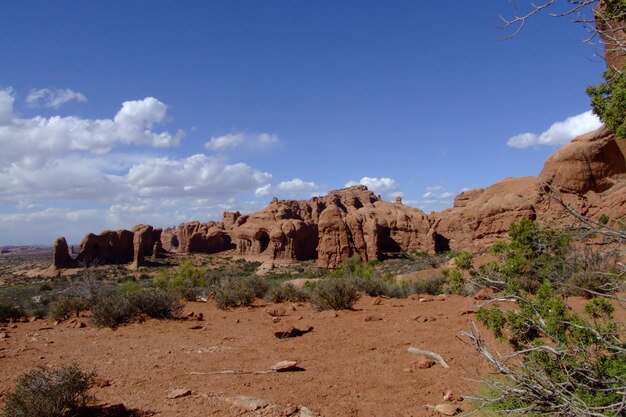 Rock formations on landscape against sky