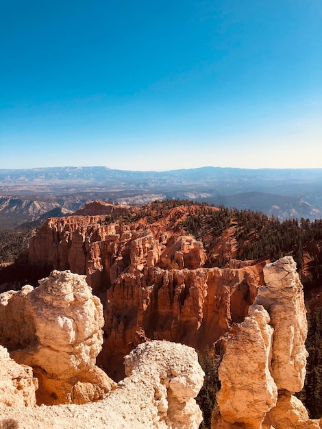 Rock formations on mountain against sky