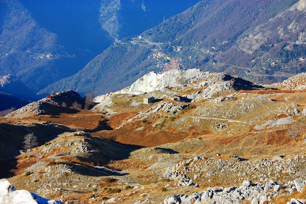 Rock formations in mountains against sky