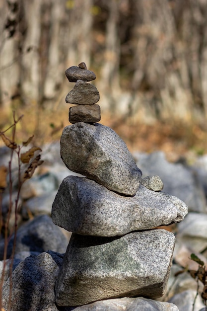 Rock pile balancing in the forest made by big and small stones