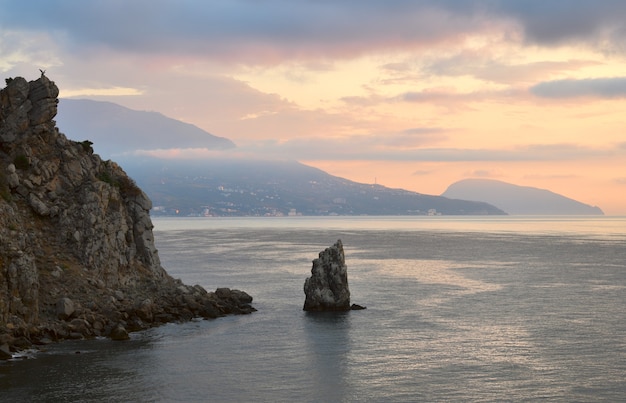 rock sail in the waters of the black sea at the castle swallows nest in the early morning