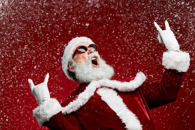 Rock santa claus on red