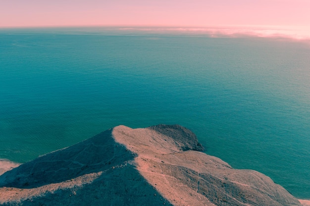 Rock in the sea Aerial view of Cabo de GataNjar reserve Almeria Andalusia Spain