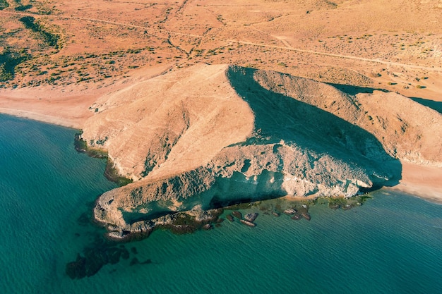 Rock in the sea Crescent Cove Aerial view Cabo de GataNjar reserve Monsul cove Almeria Andalu