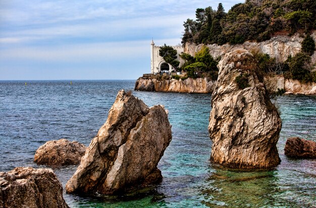 Rock on the sea, Miramare castle. Trieste