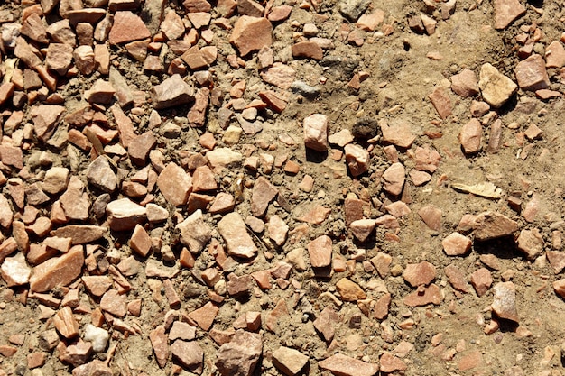 Rock and stone sand ground close up texture background top view