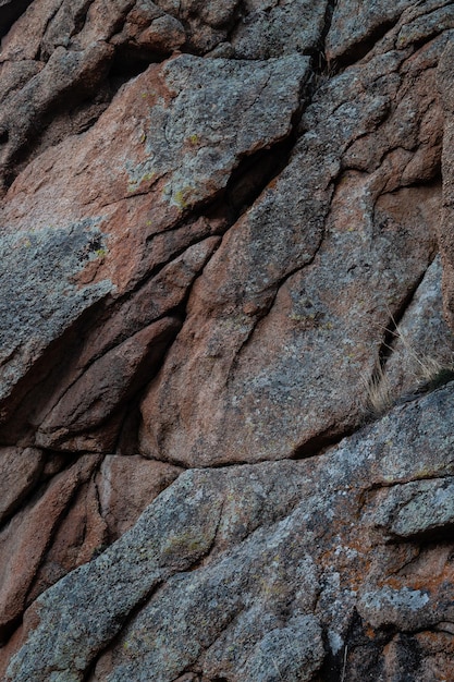 A rock with a red and gray color.