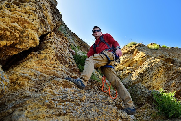 Rockclimber climbing on rock