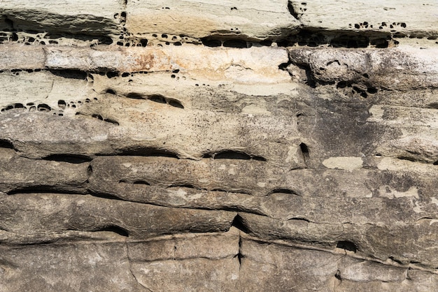 The rocks are colorful rock formations that have been deposited over hundreds of years Background and texture High quality photo