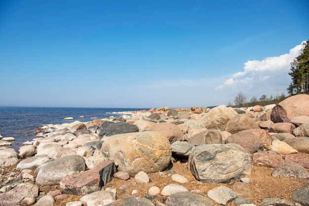 Rocks on beach against sky