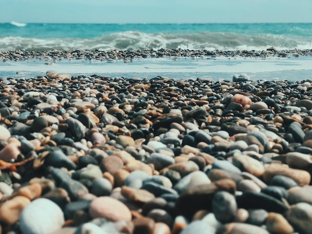 Photo rocks on beach against sky