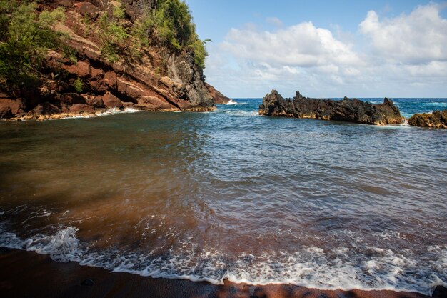 Rocks on the beach view of a rocky coast on ocean