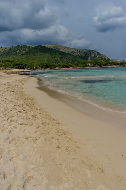 Rocks by the Mediterranean sea on the island of Ibiza in Spain, holiday and summer scene