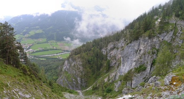 Rocks and fog Alps mountains in Austria