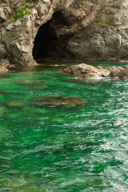 Rocks and grotto on the seashore