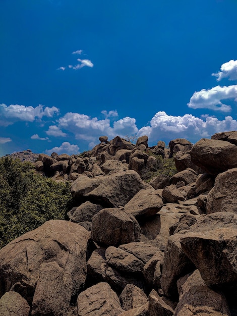 Rocks on mountain against sky