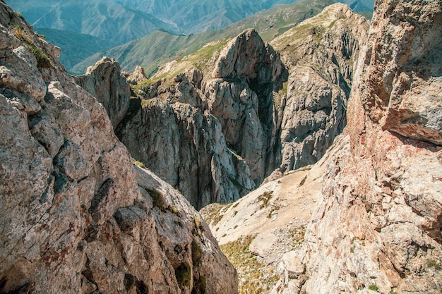 Rocks and mountains under blue sky