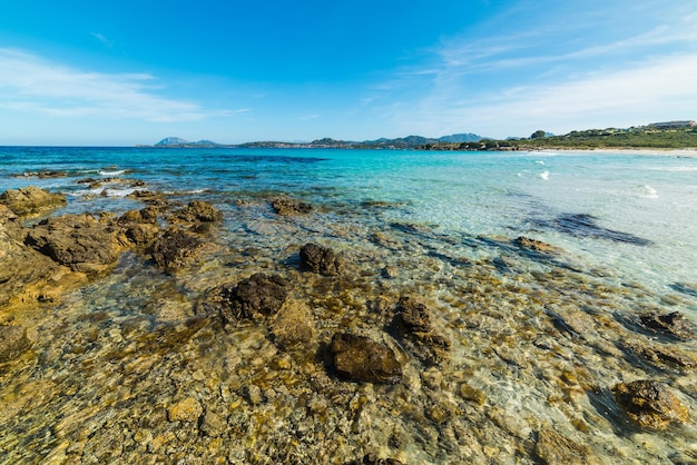 Rocks in Rena Bianca shoreline Sardinia