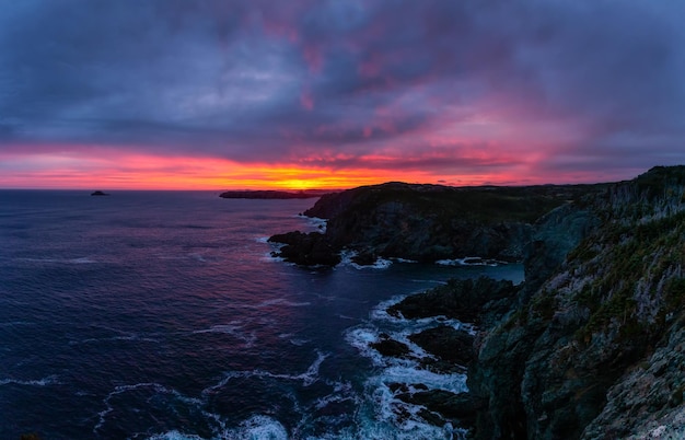 Rocky Atlantic Ocean Coast during a vibrant sunrise Nature Background