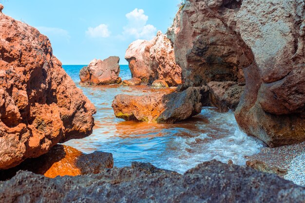 Rocky bay on the blue sea on a summer day seascape