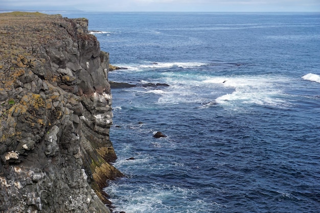 Rocky cliffs in Arnastrapi village at Snaefellsnes Peninsula Iceland