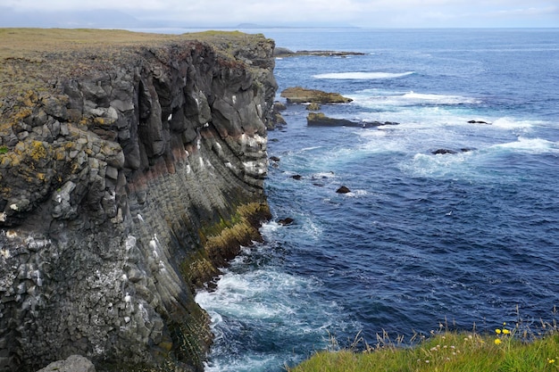 Rocky cliffs in Arnastrapi village at Snaefellsnes Peninsula Iceland